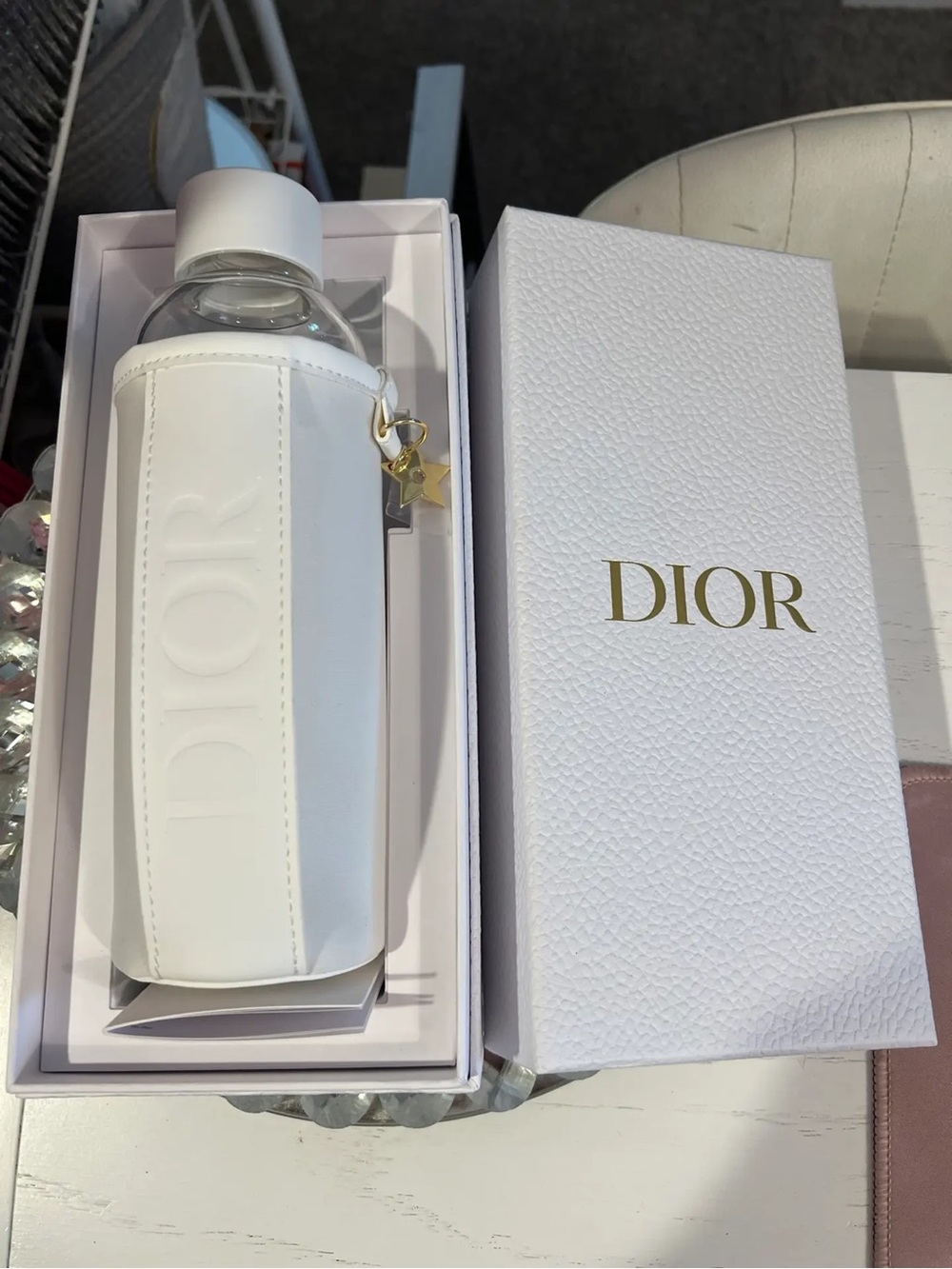 Dior watter bottle with White Leather Bottle Holder and Gold Star Charm